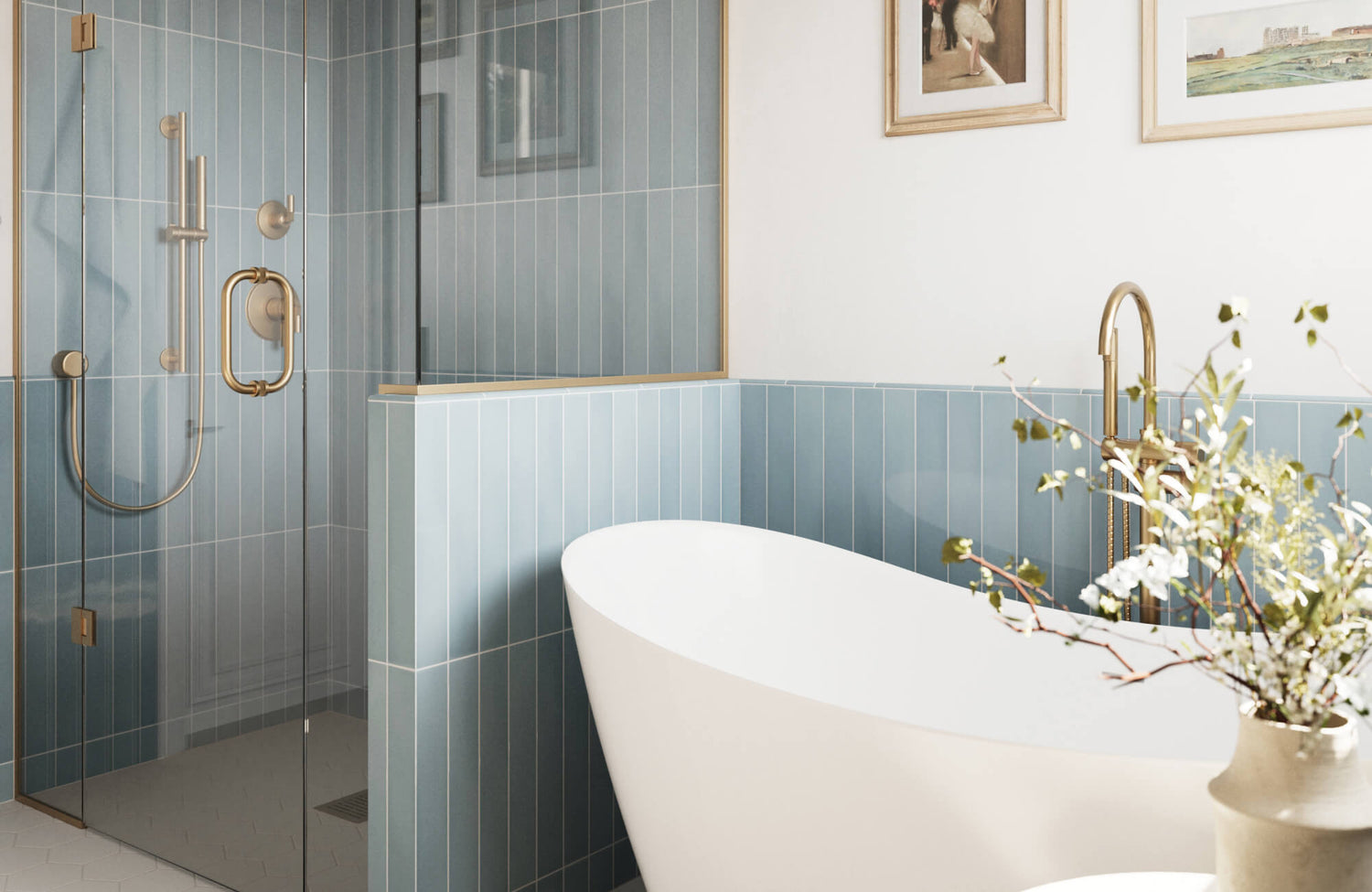 Modern bathroom with serene blue subway tiles, a freestanding white tub, and a glass-enclosed shower featuring brass fixtures.