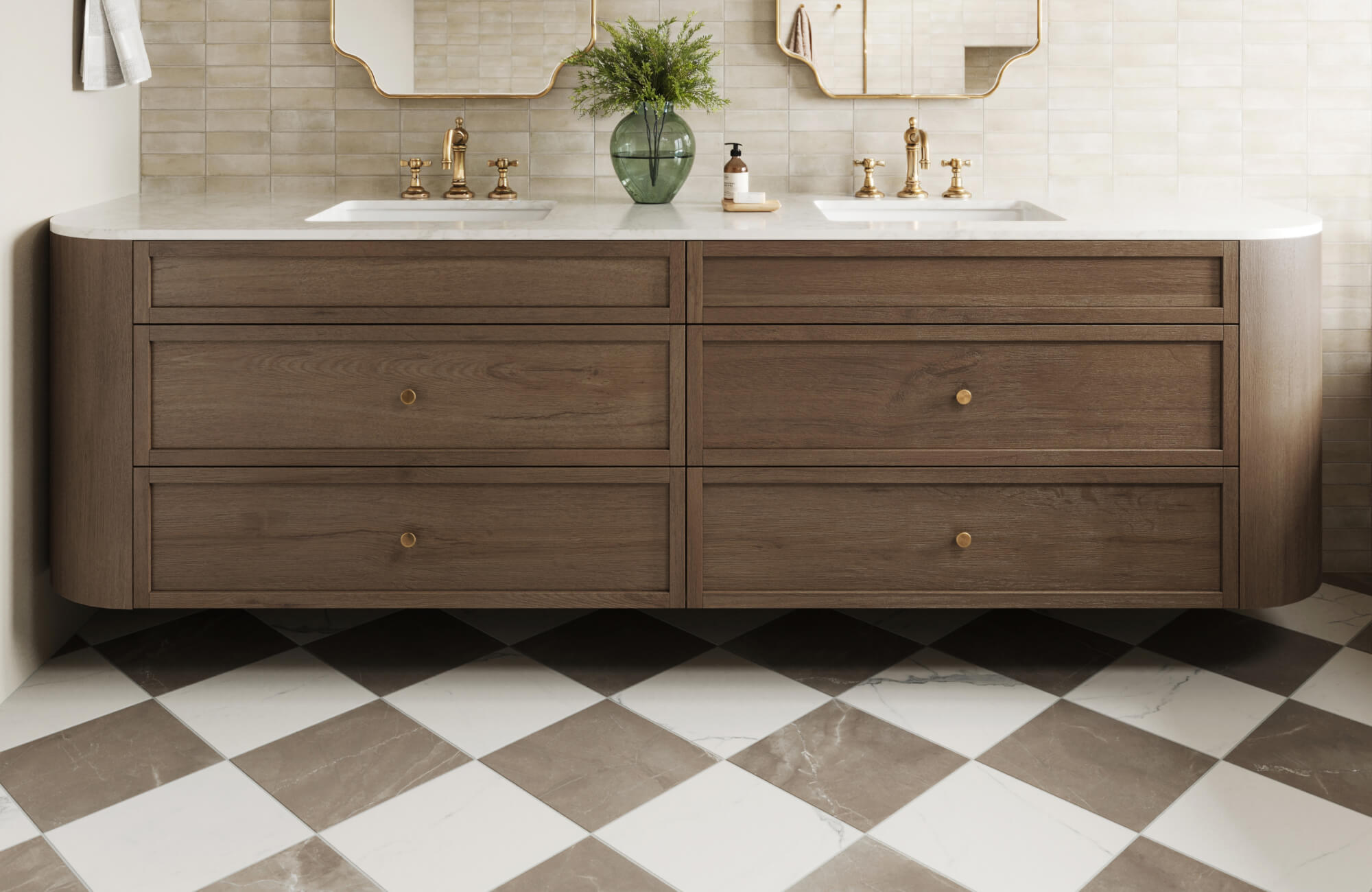 Modern bathroom vanity with smooth wood-grain cabinetry, complemented by gold hardware and faucets, set against glossy beige subway tiles and a bold checkered marble look floor.