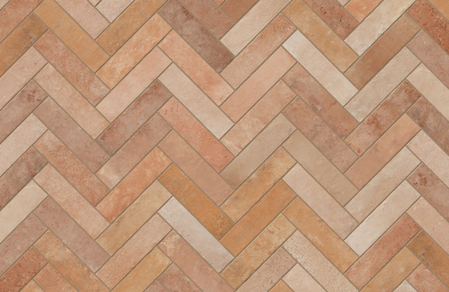 Close-up of a herringbone-patterned tile arrangement in warm tones of brown and orange, showcasing a stylish and contemporary design perfect for modern spaces.