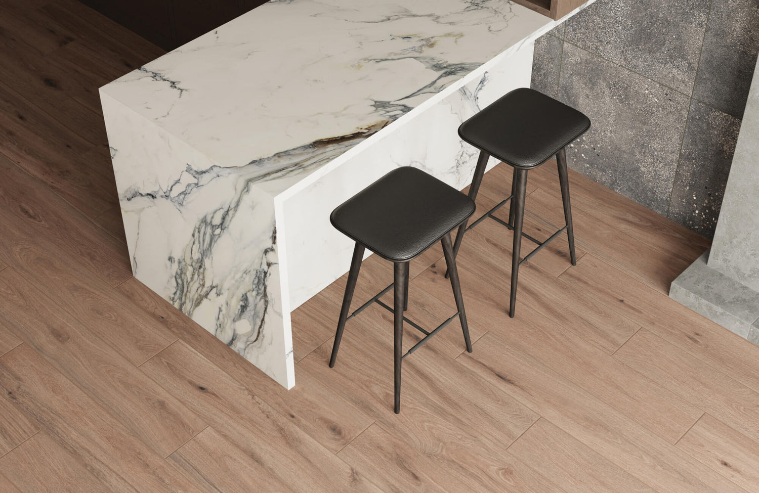 Modern kitchen with warm wood-look floor tiles contrasted by a sleek marble waterfall countertop and minimalist black bar stools.