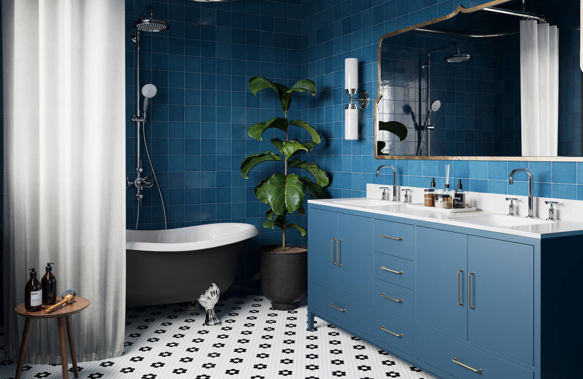 Rich blue wall tiles create a bold backdrop in this elegant bathroom, featuring a freestanding tub, dual vanity, and intricate black-and-white mosaic floor.