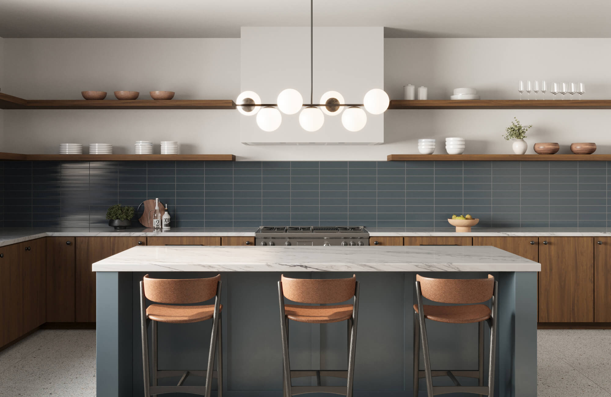 Modern kitchen with horizontal dark blue subway tile backsplash, wooden cabinetry, and a marble island, highlighted by a sleek globe light fixture.