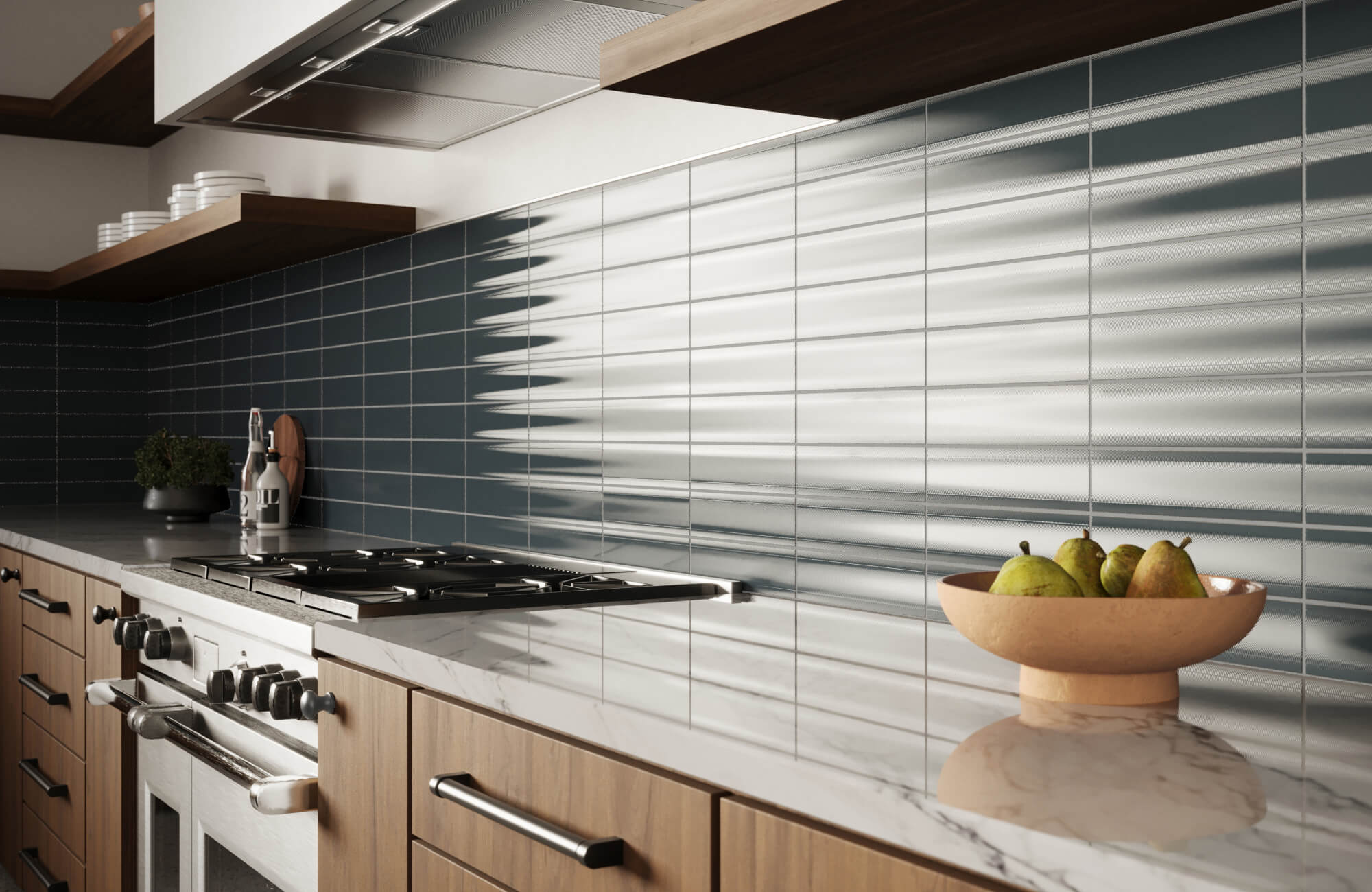 A modern kitchen featuring deep blue glossy subway tiles, warm wood cabinetry, and marble countertops for a sleek, contemporary look. 