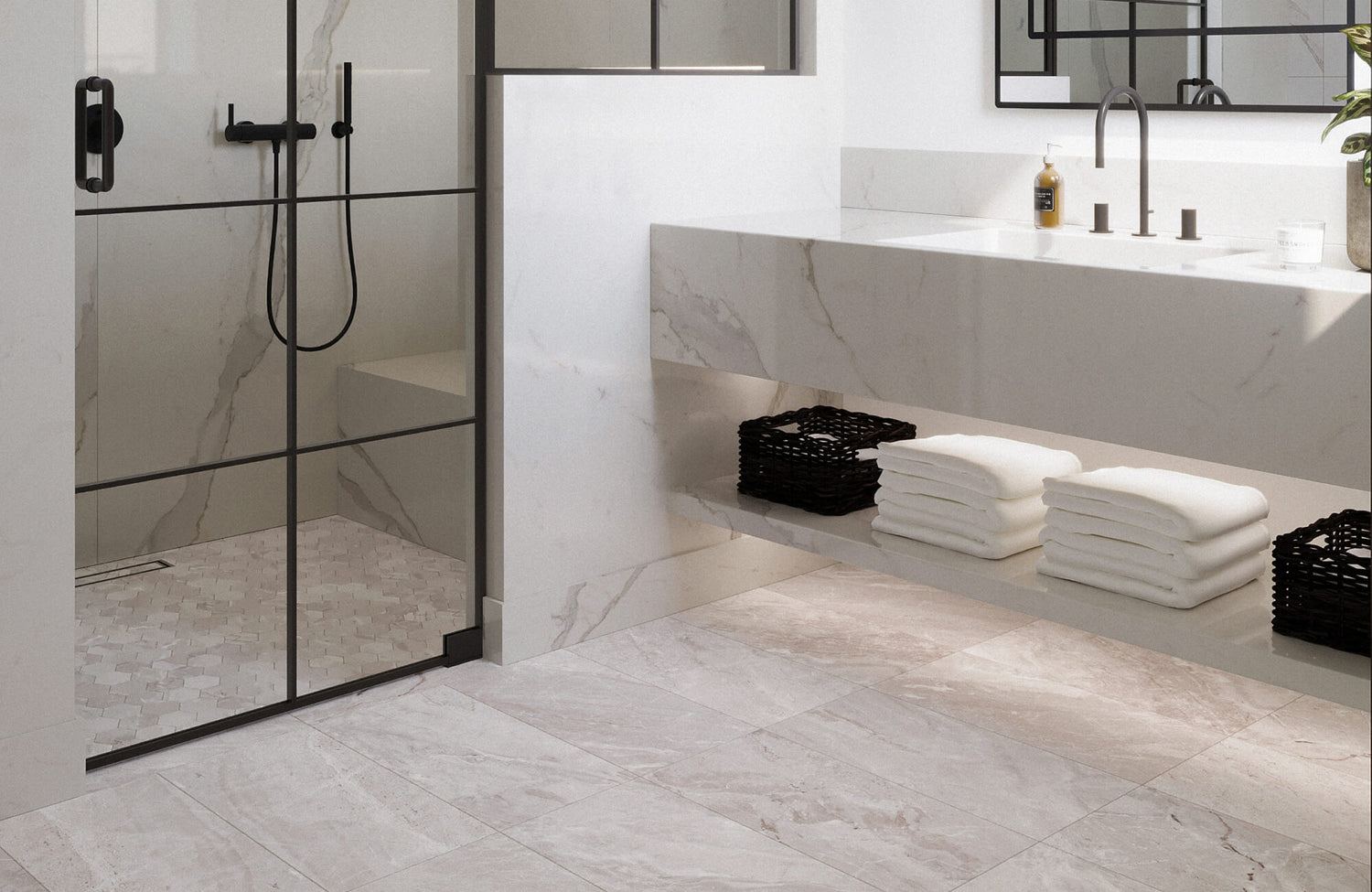 A modern bathroom featuring marble-look tiles with soft gray veining, a sleek black-framed shower enclosure, and neatly stacked towels on an open shelf.