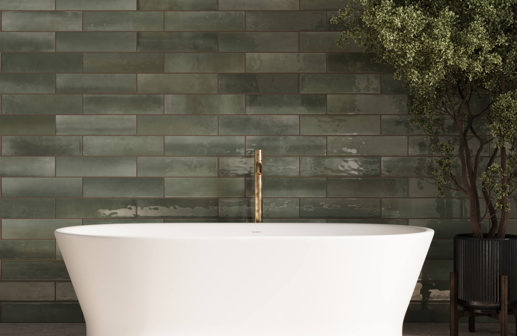 Mystic green subway tiles with a watercolor effect create a spa-like sanctuary, enhancing the luxurious freestanding tub