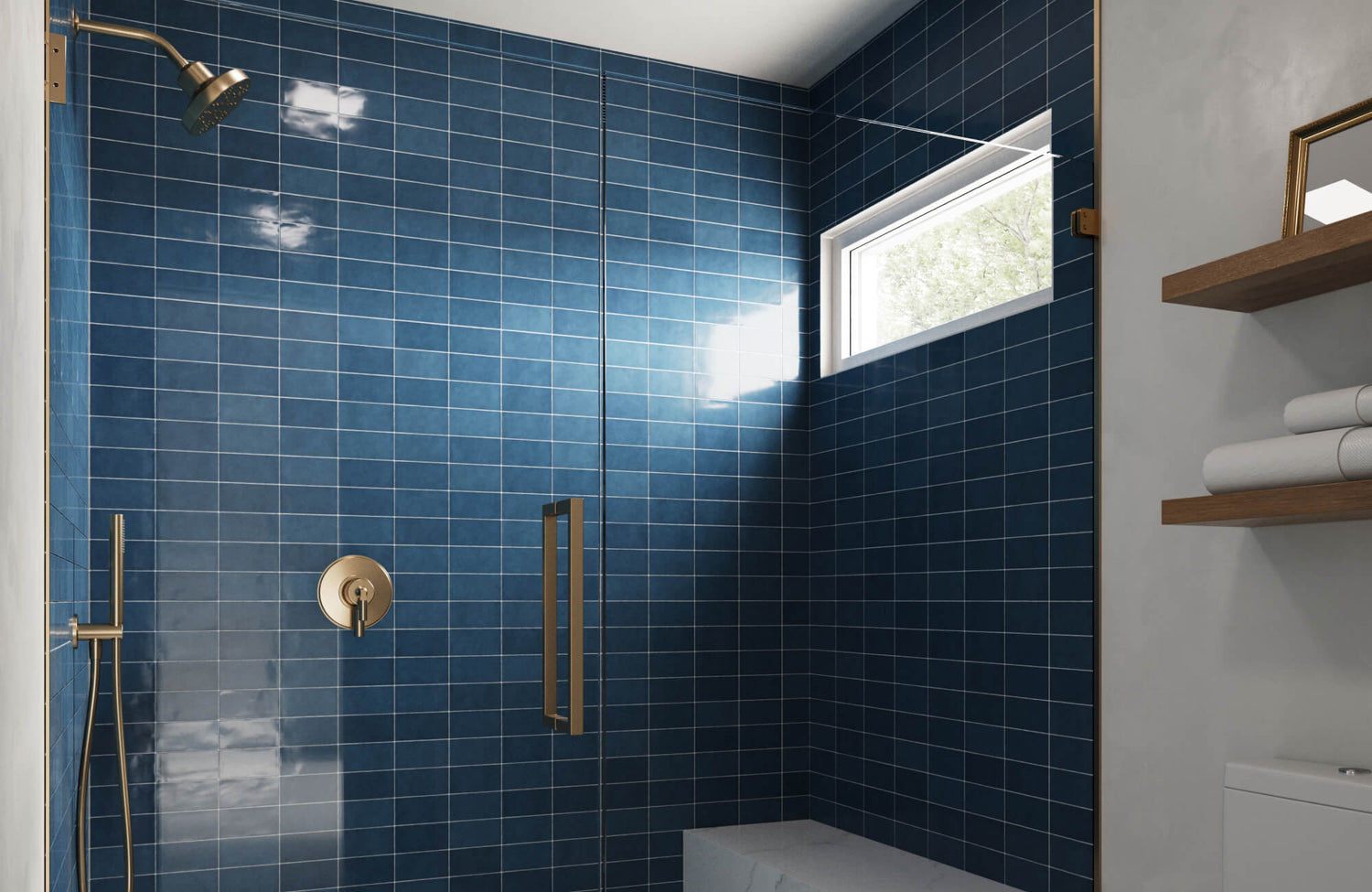 Sleek shower with bold blue tiles and brass fixtures, accented by natural light from a small window, creating a vibrant, modern look.