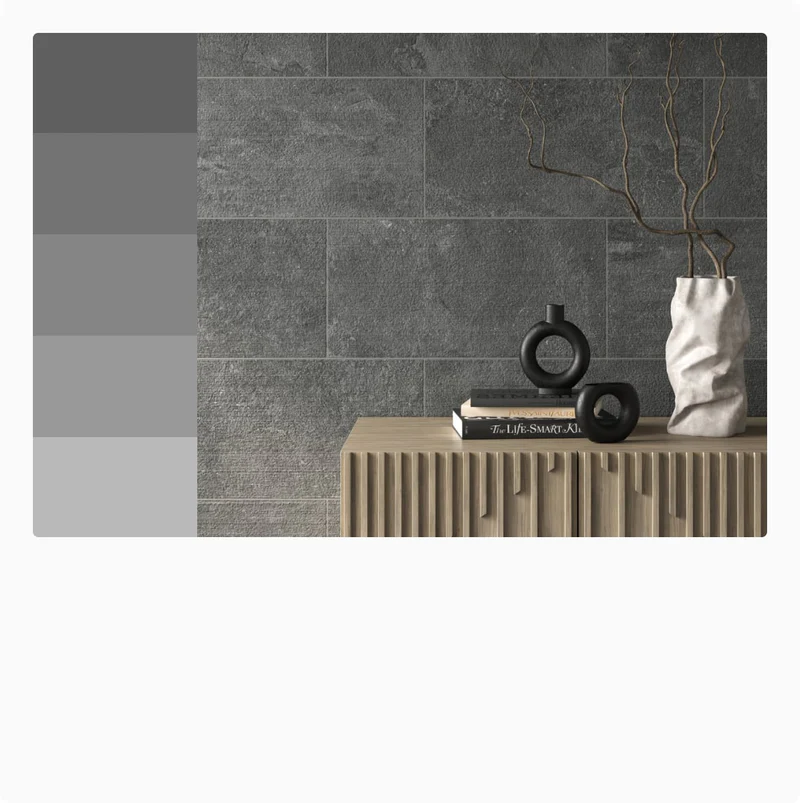 Textured gray tiles add a modern and sophisticated touch to this space, paired with minimalist decor and a sculpted wooden console