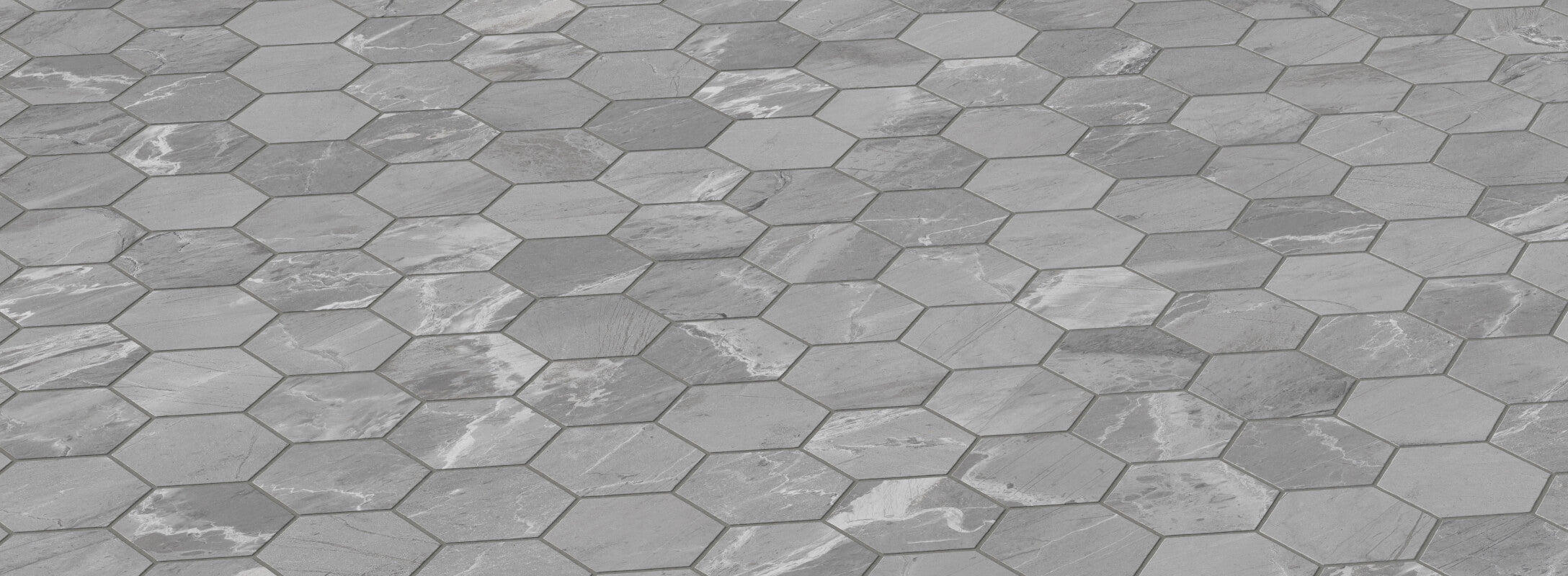 Dark grey hexagonal tiles with a subtle marble-like texture, creating a sleek and contemporary shower floor