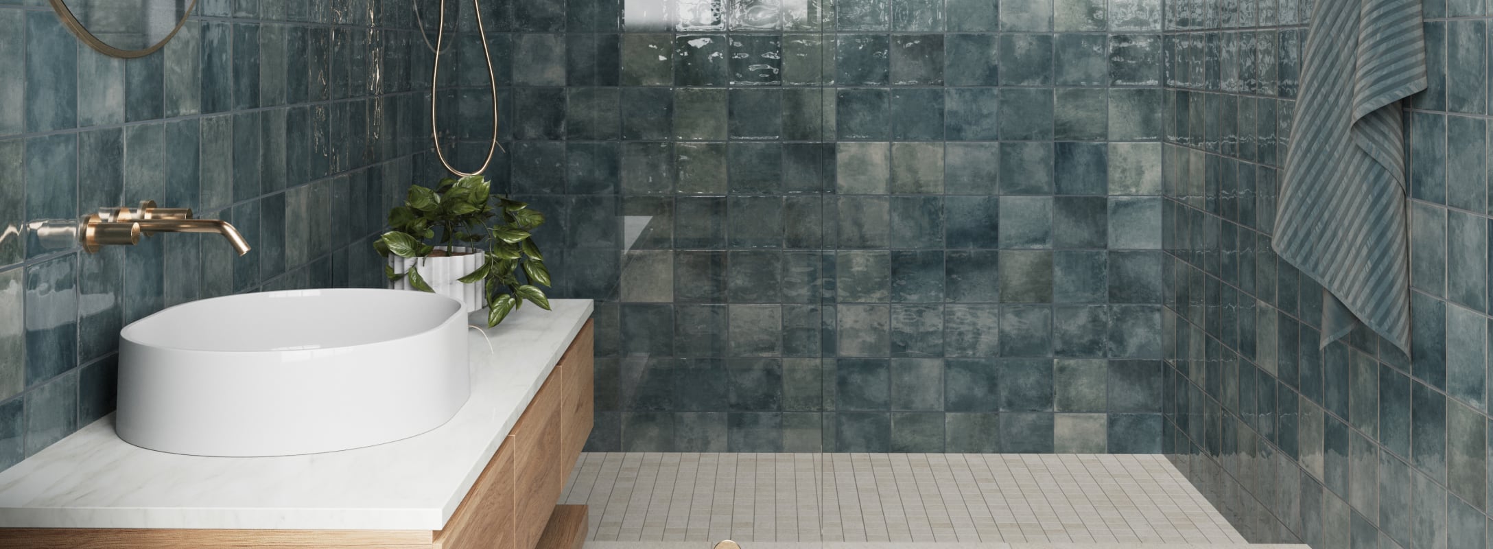 Ceramic blue tiles in a sleek bathroom setting, exuding modern sophistication and tranquil elegance.