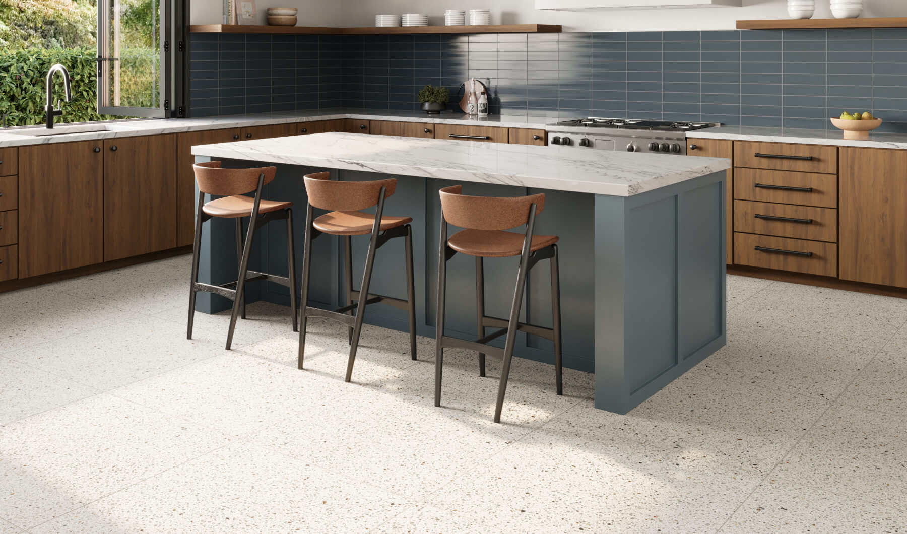 Modern kitchen featuring terrazzo-look floor tiles, a blue island with a marble countertop, wooden cabinetry, and stylish bar stools