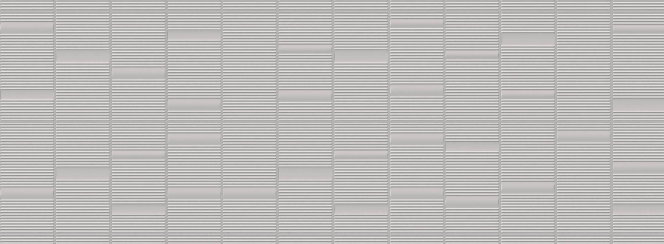 Close-up of grey wall tiles with a linear textured pattern, creating a sleek and modern aesthetic for contemporary kitchen designs