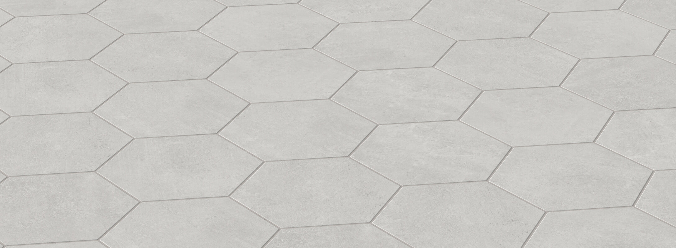 Light grey hexagonal tiles create a modern and sleek flooring option, perfect for contemporary kitchen designs