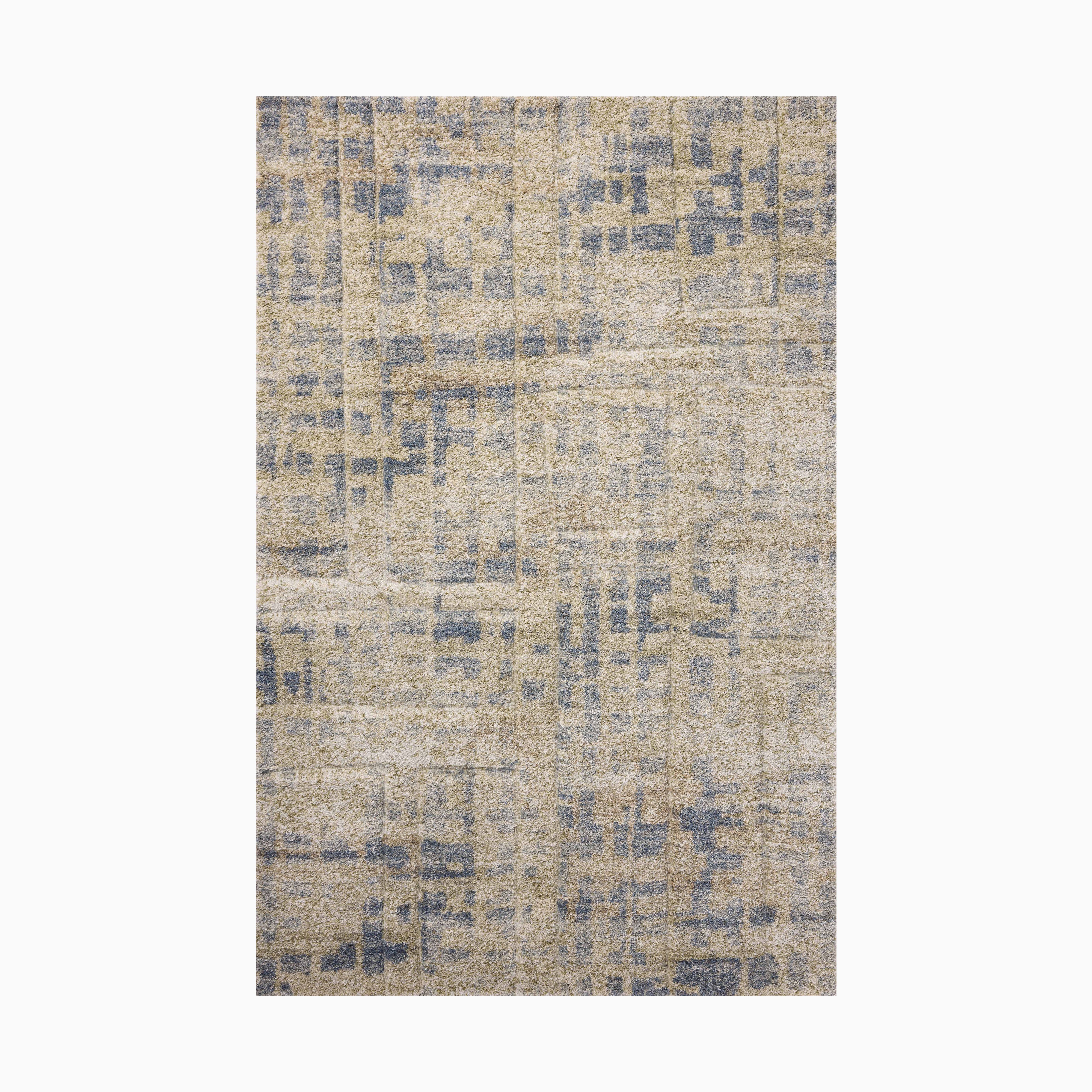 Modern area rug with a distressed beige and blue abstract pattern, adding a contemporary touch to any space.