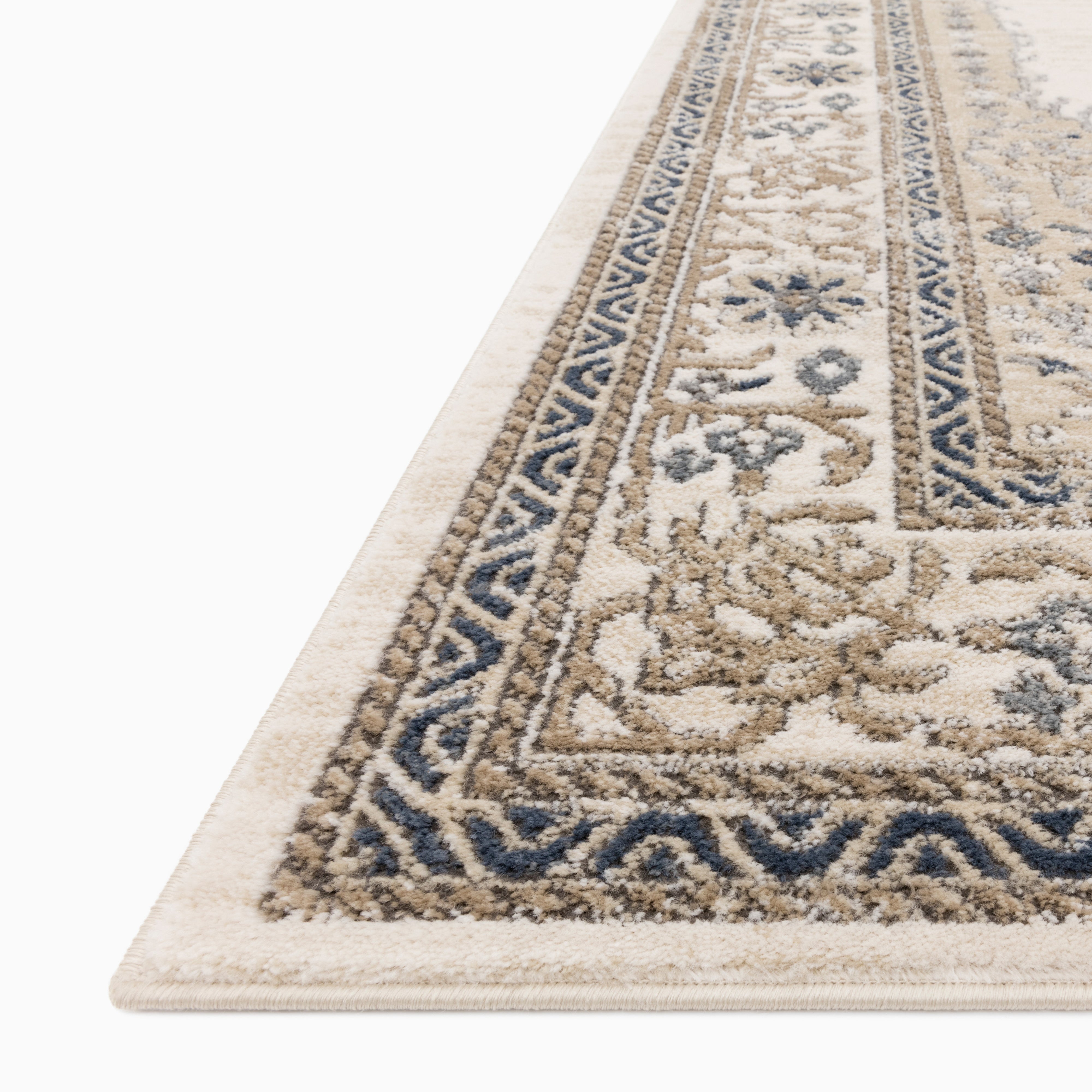 Charlise Polypropylene & Polyester Pile Rug in Natural / Navy