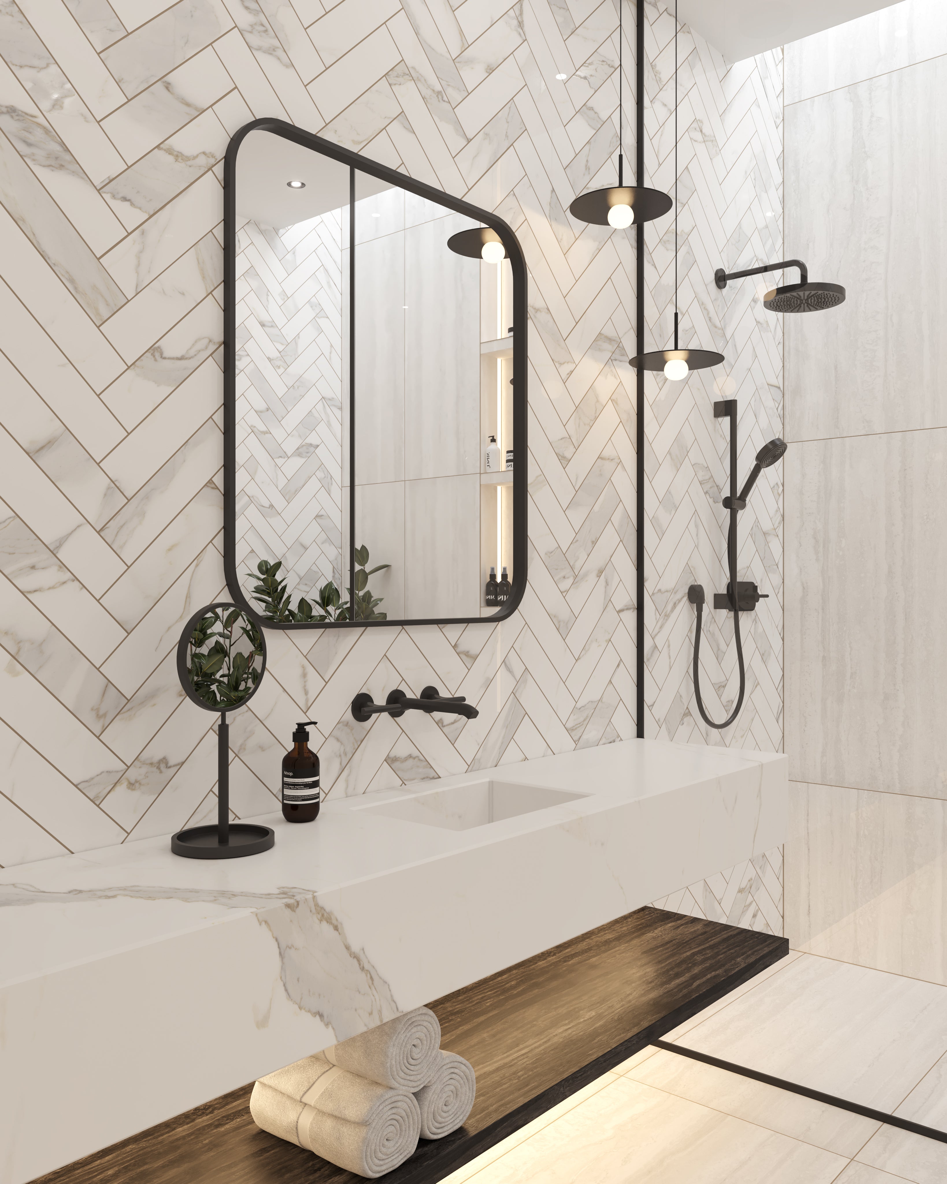 A luxurious contemporary bathroom featuring walls adorned with Aniston 3x12 subway tiles in a herringbone pattern and a floating basin featuring 48x110 porcelain panels, all in the exquisite Calacatta Top color.