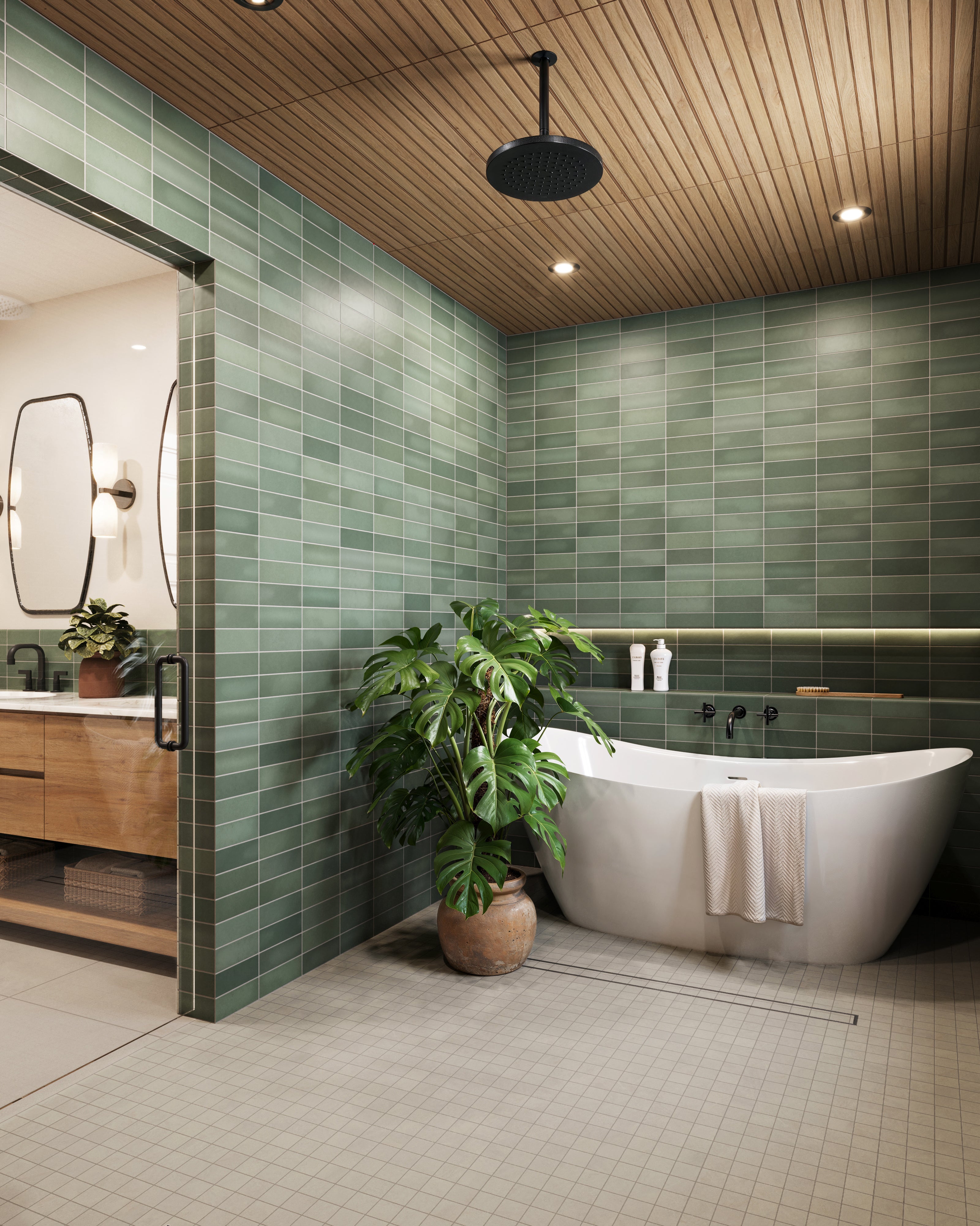 Modern bathroom showcasing matte green subway tiles, Zayne 12x36 matte ceramic tile in a brown ribbed wood slat ceiling, a freestanding white tub, and a lush monstera plant in a ceramic pot.