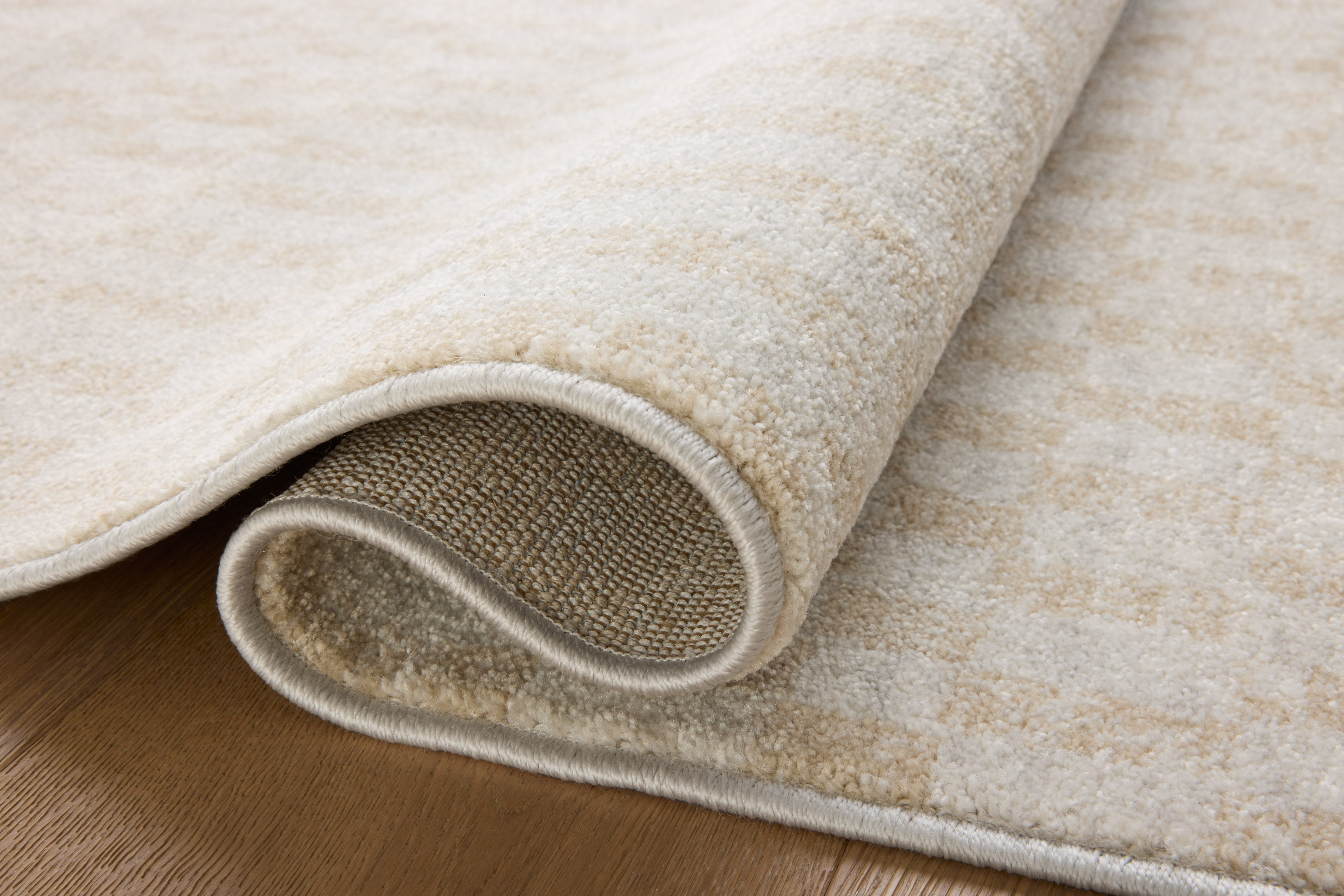 Liddy Polyester Pile Rug in Cream / Sand