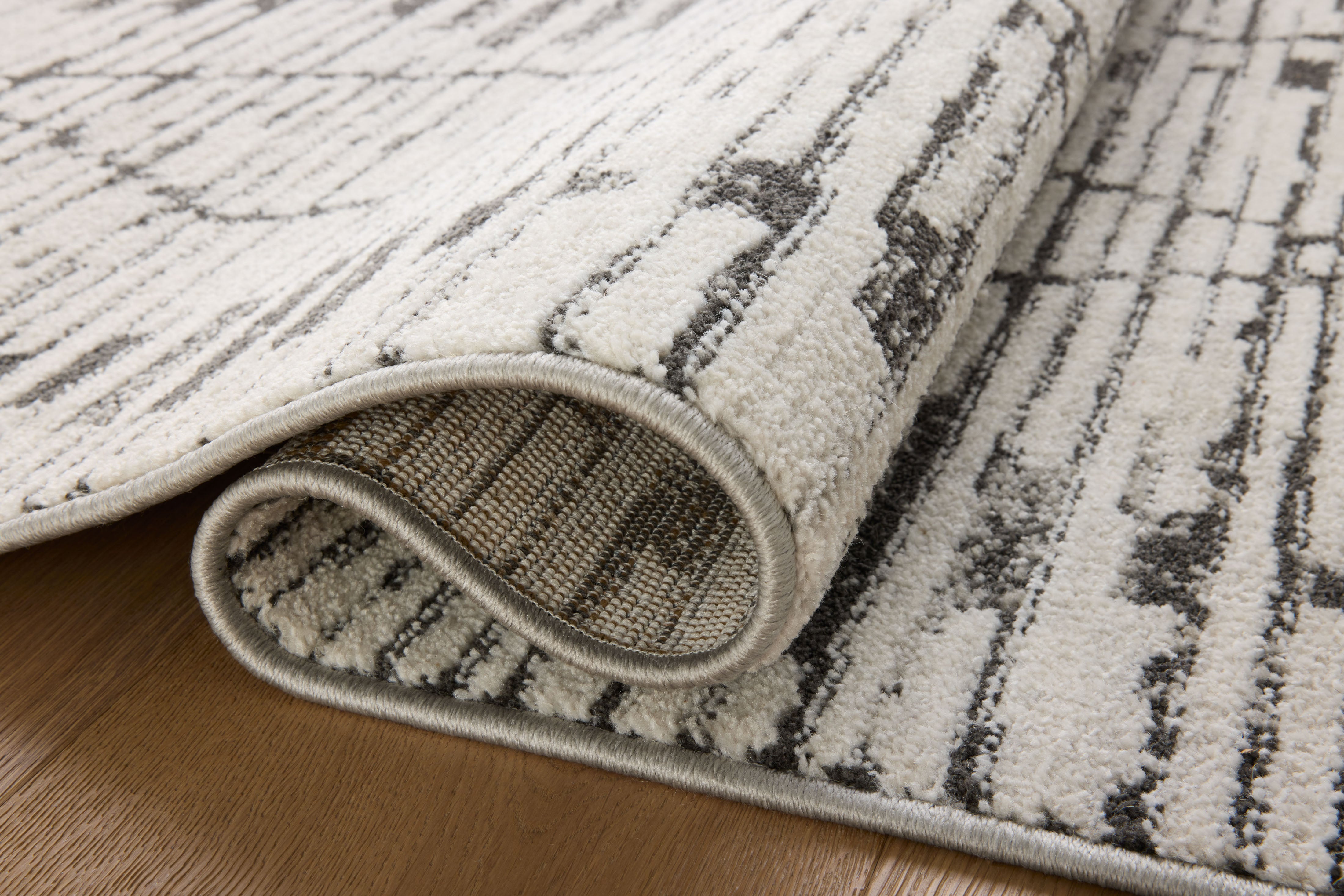 Liddy Polyester Pile Rug in Graphite / Platinum