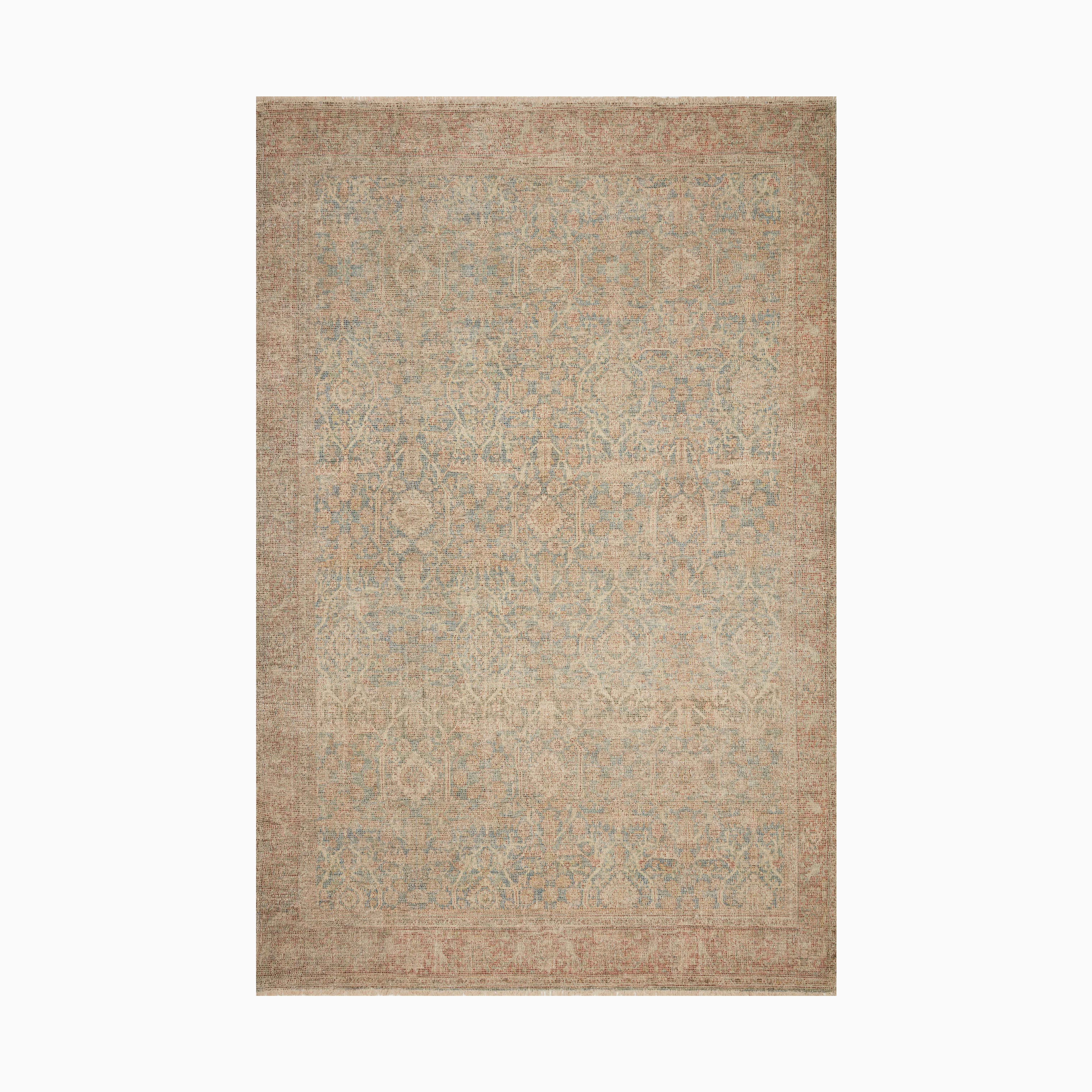 Vintage-style rug with intricate crimson and navy floral patterns, featuring a faded aesthetic for a timeless, elegant look.